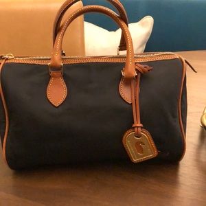 Dooney & Bourke Nylon Satchel hot pink lining. 2 interior pockets.